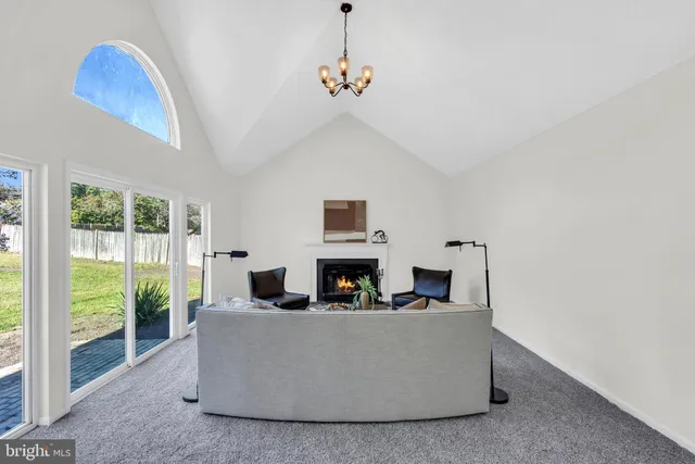 a bedroom with a bed and a lamp on table