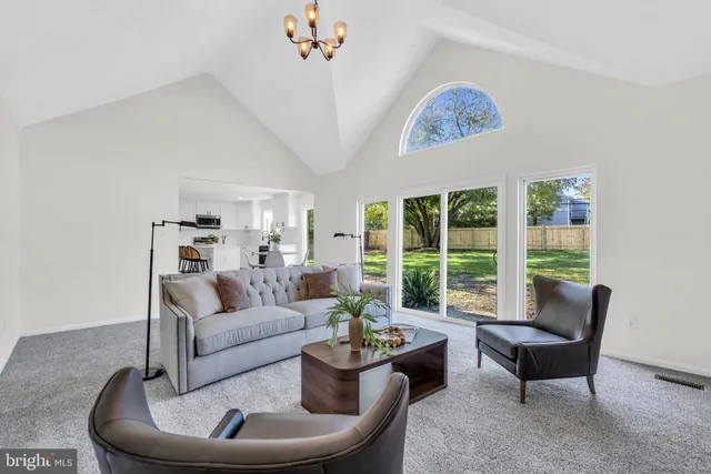 a en suite bathroom with 2 sink tub and a mirror