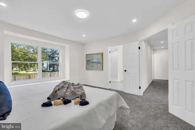 a view of a yard with a house in the background