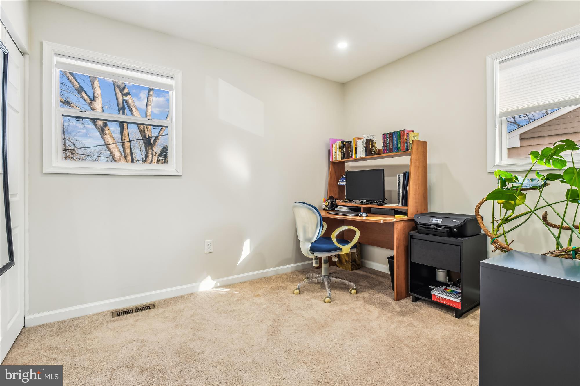 232 Candytuft Road Reisterstown, MD 21136 - Photo 16 of 42 a view of a workspace with furniture and a window