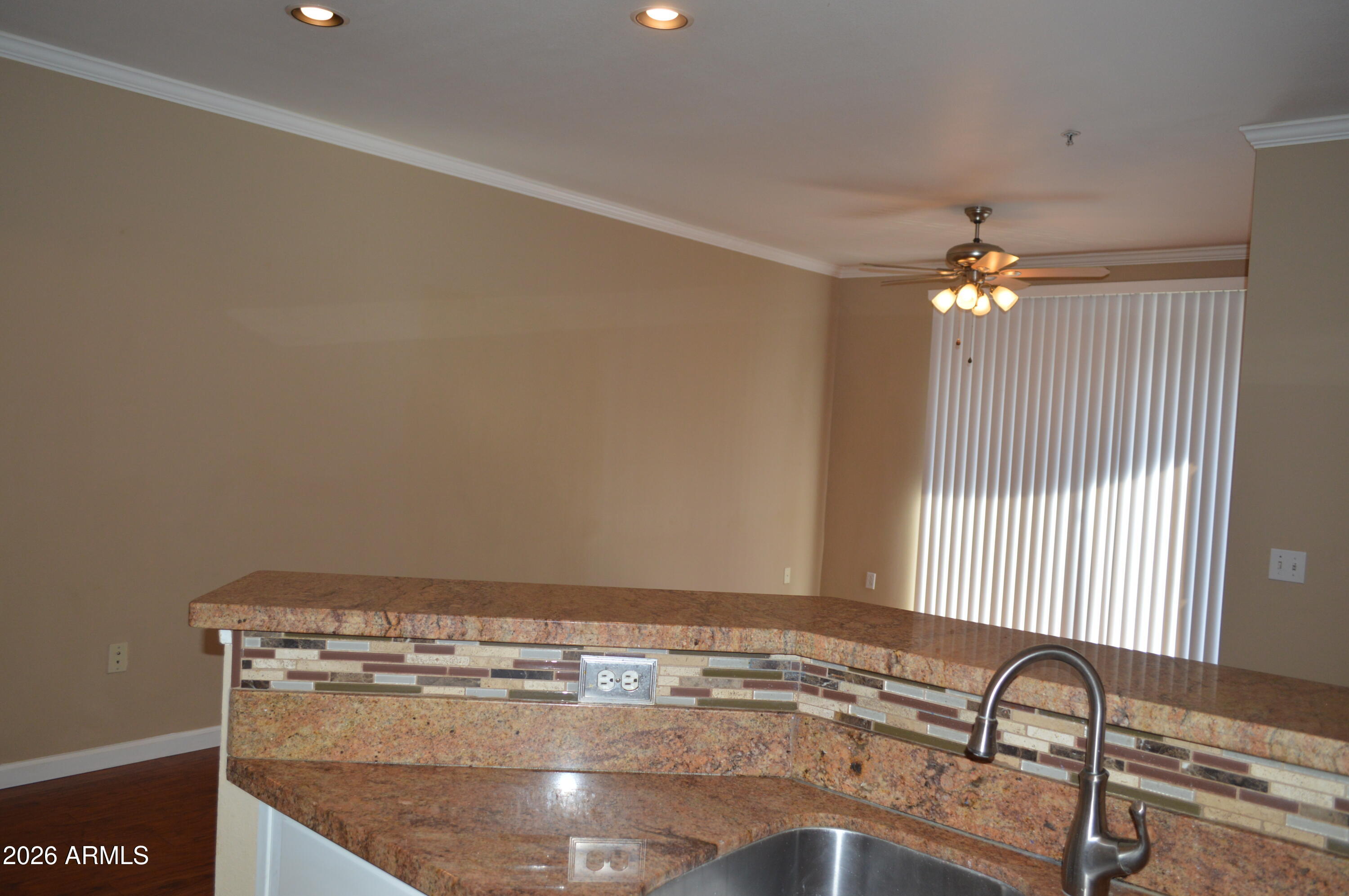 1701 East Colter Street, Unit 361 Phoenix, AZ 85016 - Photo 12 of 68 a room with a chandelier