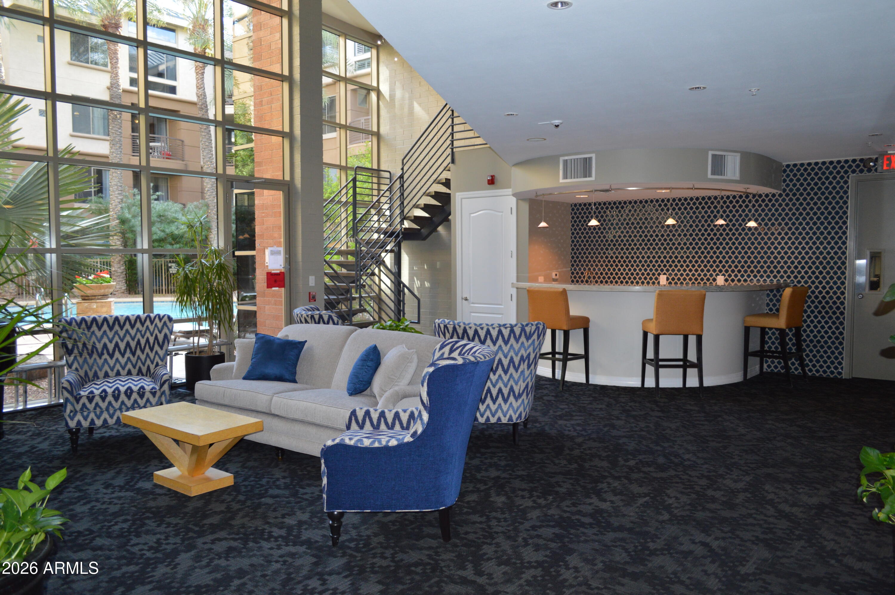 1701 East Colter Street, Unit 361 Phoenix, AZ 85016 - Photo 38 of 68 a outdoor living space with patio furniture and a potted plant