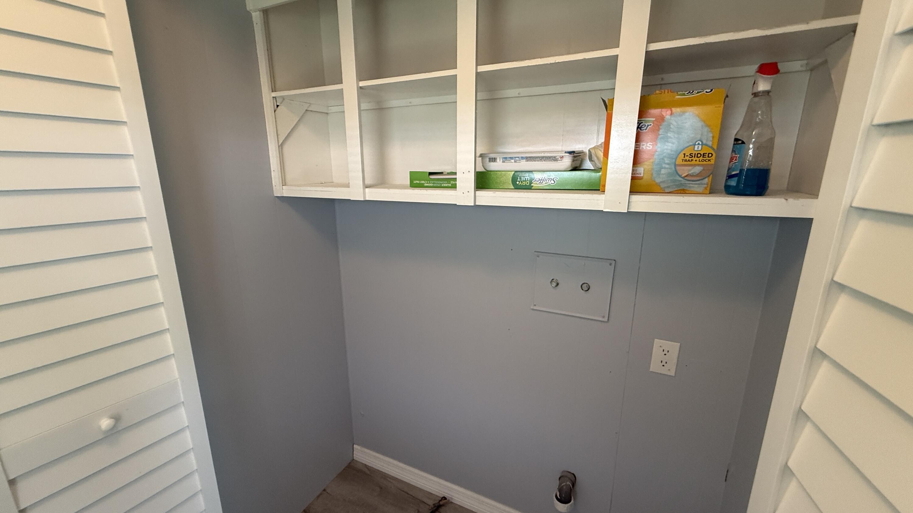 6919 Southeast Congress Street Hobe Sound, FL 33455 - Photo 12 of 52 a view of a door and a window