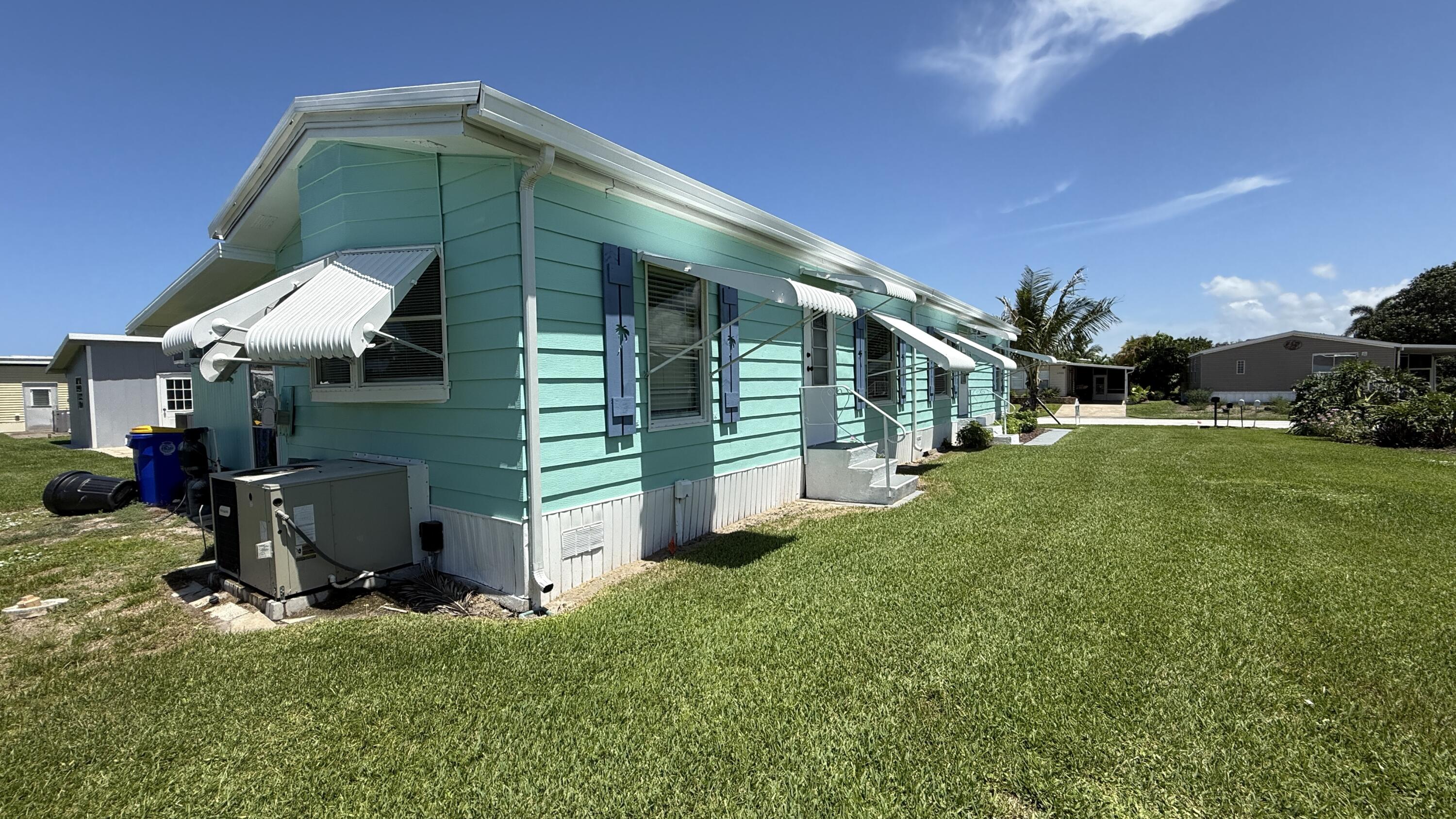 6919 Southeast Congress Street Hobe Sound, FL 33455 - Photo 38 of 52 a view of outdoor space and yard