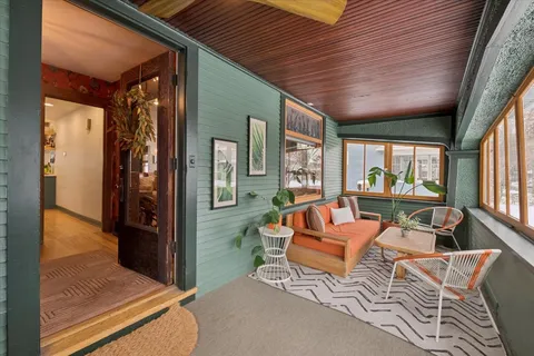 a outdoor space with patio the couches and a dining table with balcony view