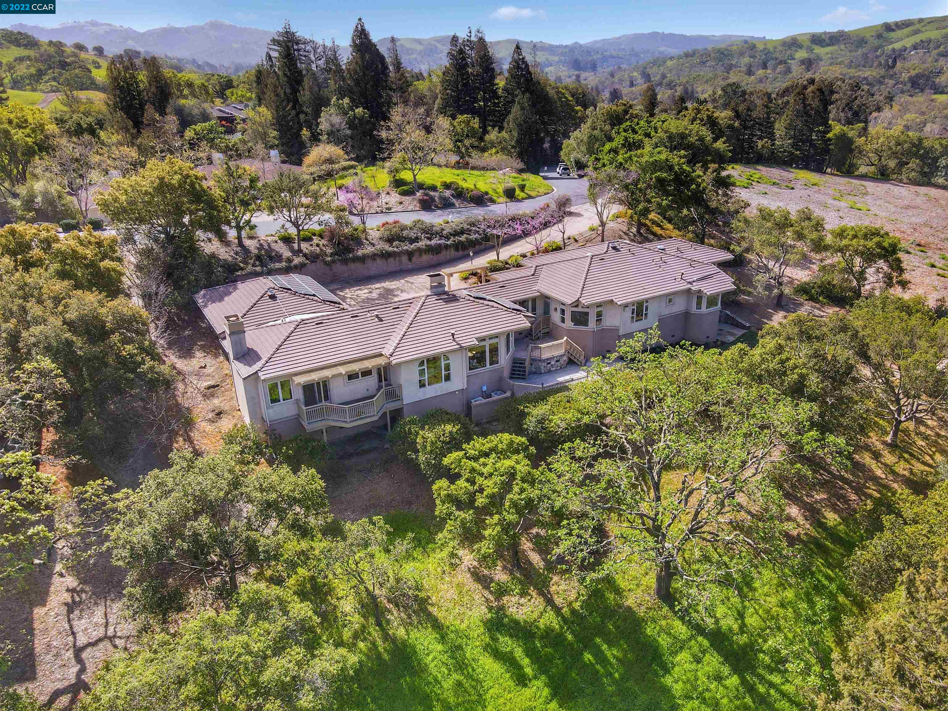 2 Diablo Oaks Way Lafayette, CA 94549 - Photo 1 of 1 an aerial view of a house with a garden
