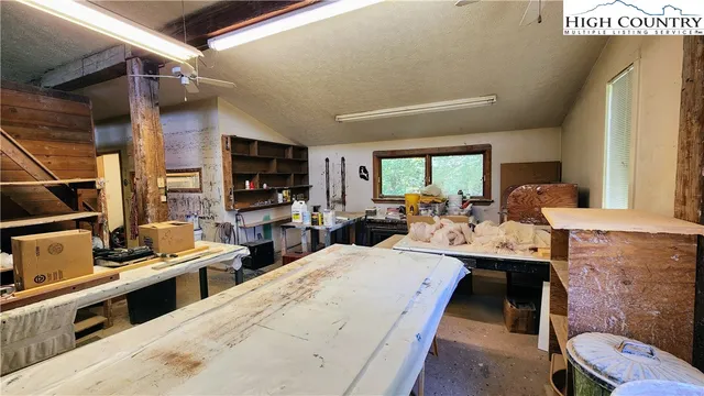 a kitchen that has a lot of cabinets in it