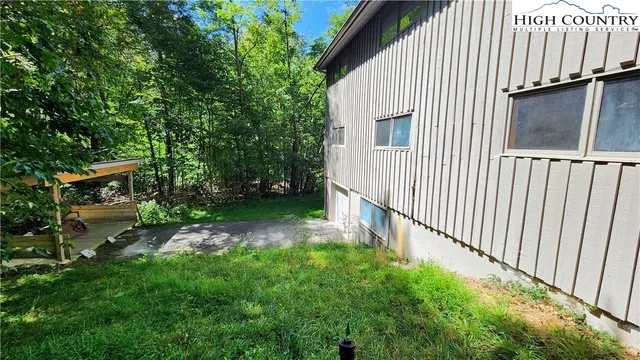 a view of a chairs and tables in the patio