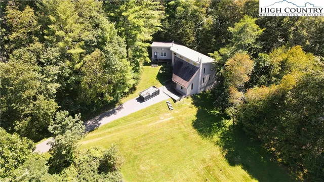a view of a lot of trees and houses