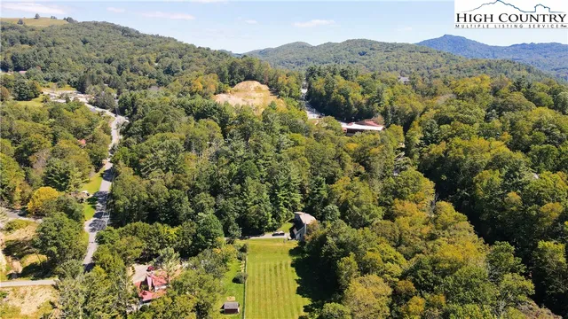 a view of front door of house with yard