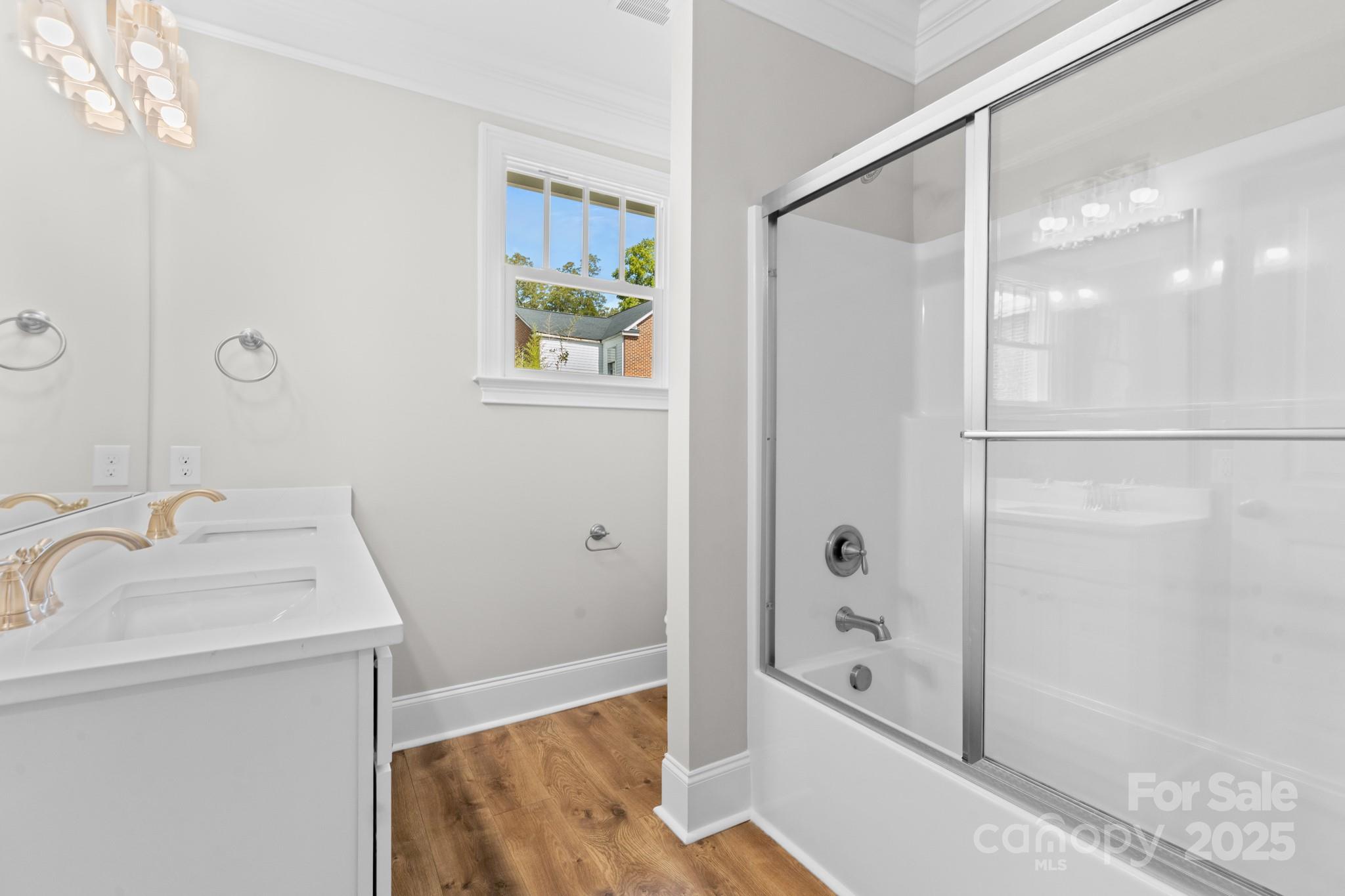 302 West Gay Street Lancaster, SC 29720 - Photo 14 of 26 a bathroom with a bathtub and a shower