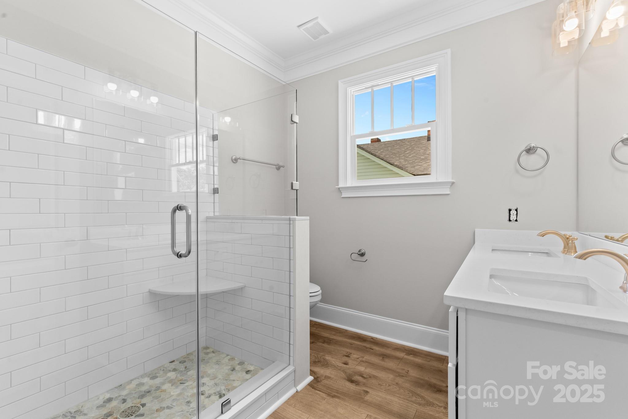 302 West Gay Street Lancaster, SC 29720 - Photo 17 of 26 a bathroom with a shower and a sink