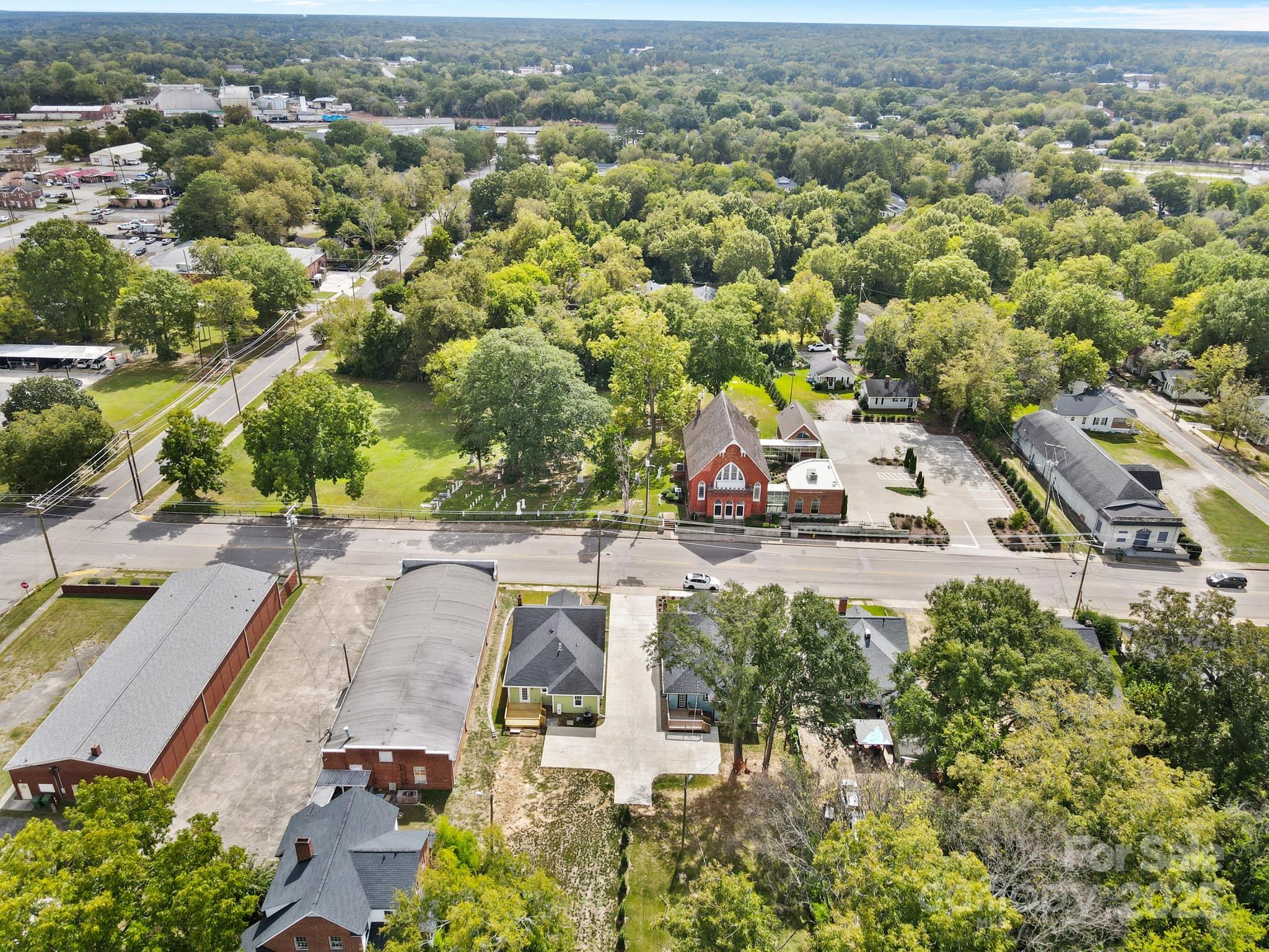 302 West Gay Street Lancaster, SC 29720 - Photo 24 of 26 an aerial view of residential houses with outdoor space
