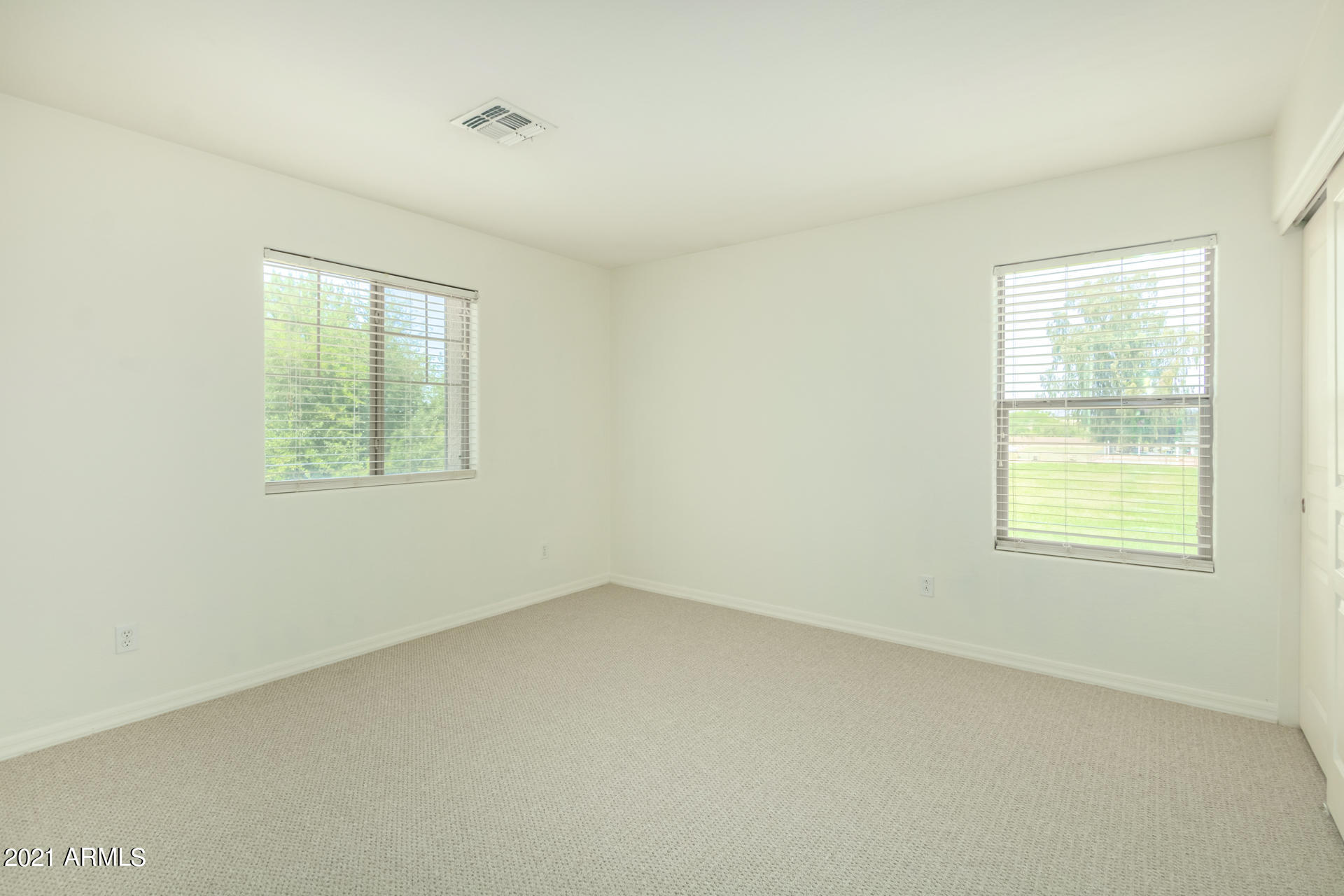 126 East Catclaw Street Gilbert, AZ 85296 - Photo 15 of 22 FRONT BEDROOM UPSTAIRS