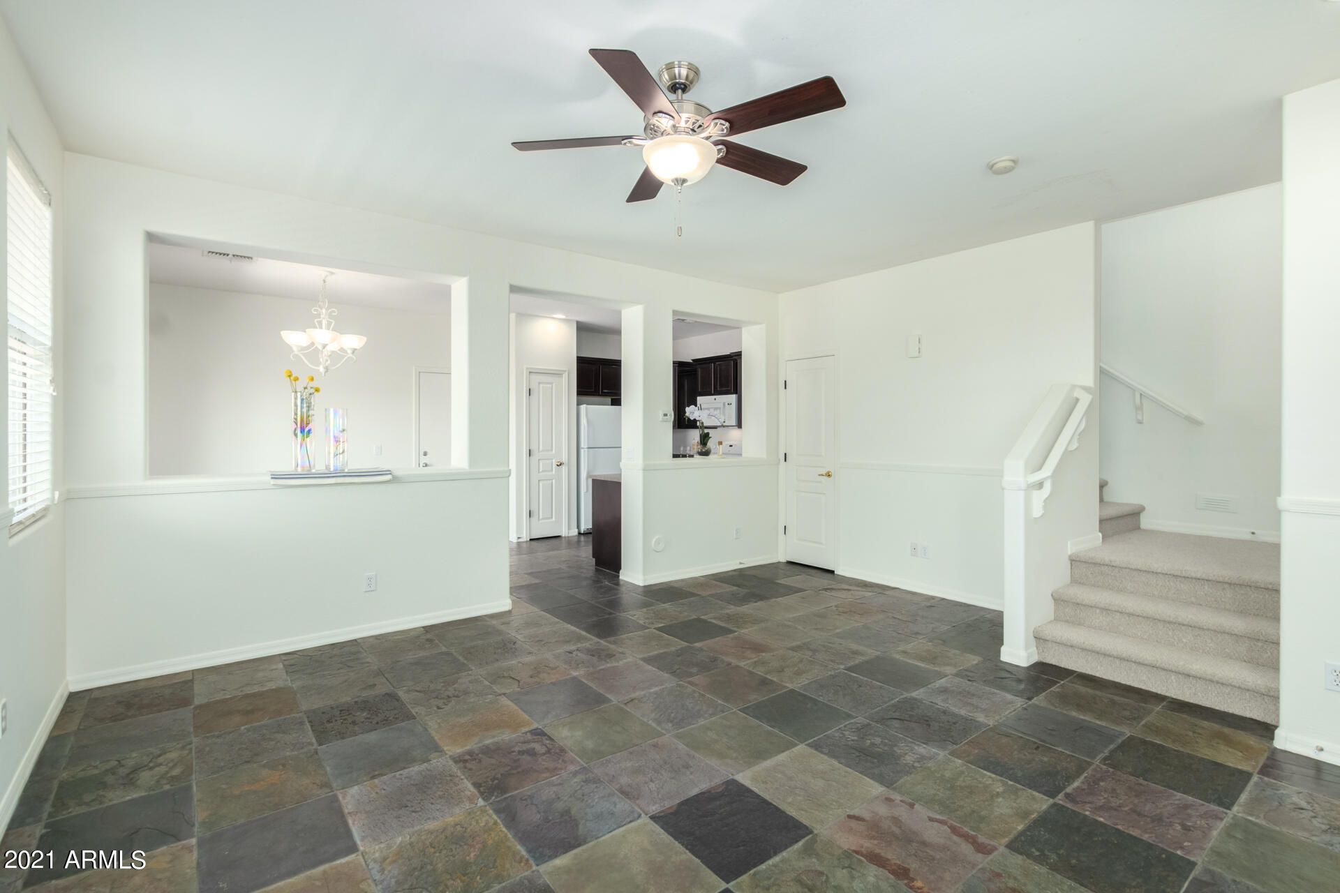 126 East Catclaw Street Gilbert, AZ 85296 - Photo 5 of 22 NICE SLATE TILE FLOORS ON LOWER LEVEL