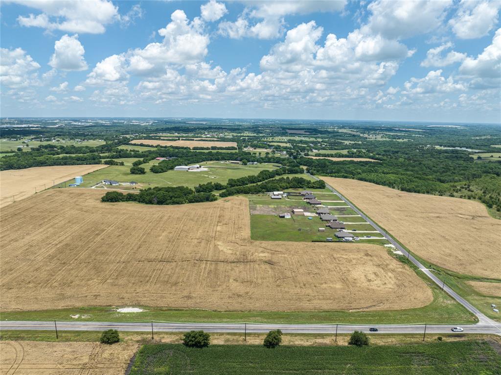 Tbd Lot 5 Tbd Road Howe, TX 75459 - Photo 3 of 14 a view of a swimming pool with an outdoor seating