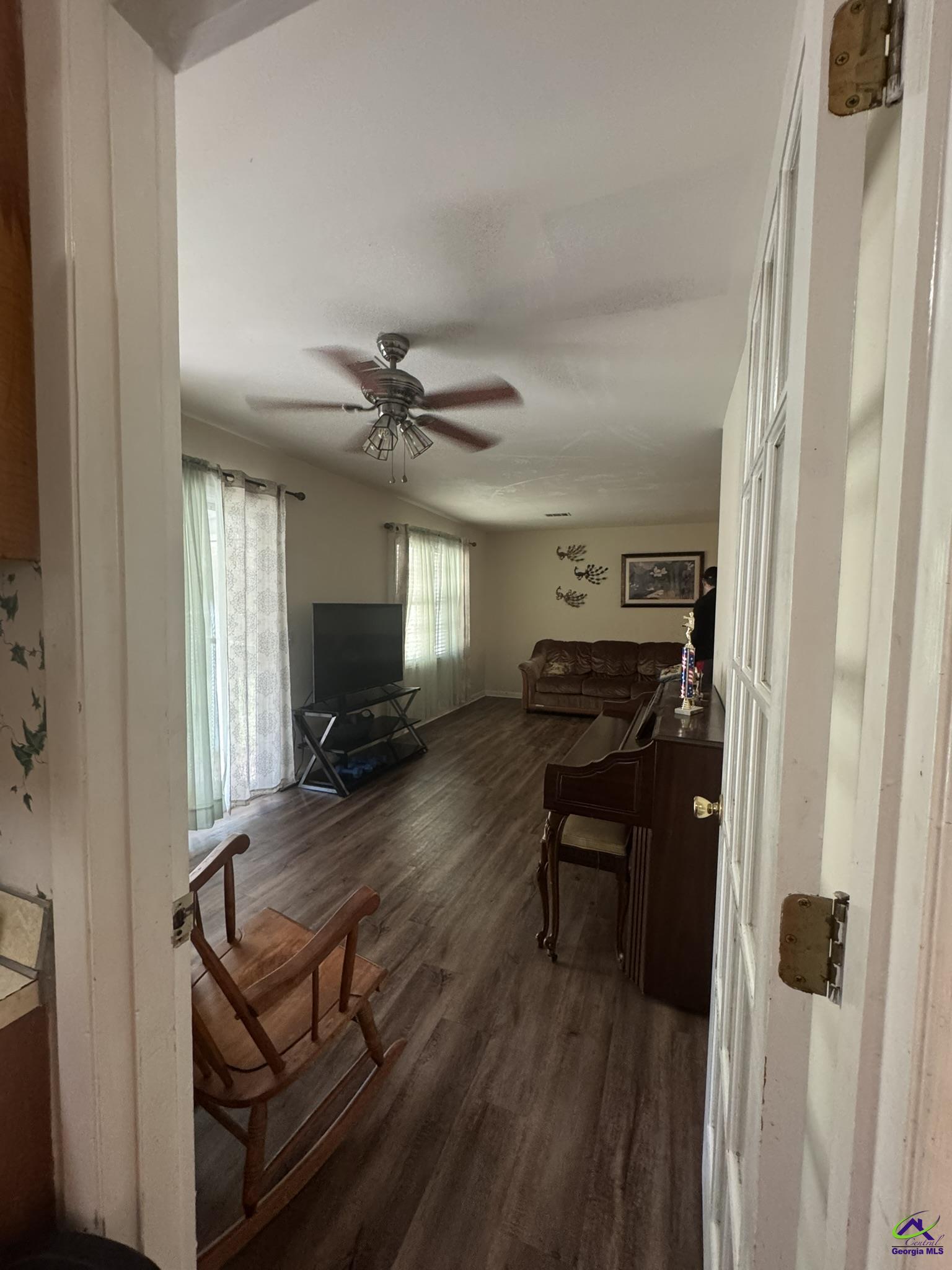 1032 Elberta Road Warner Robins, GA 31093 - Photo 10 of 26 a living room with furniture and a wooden floor