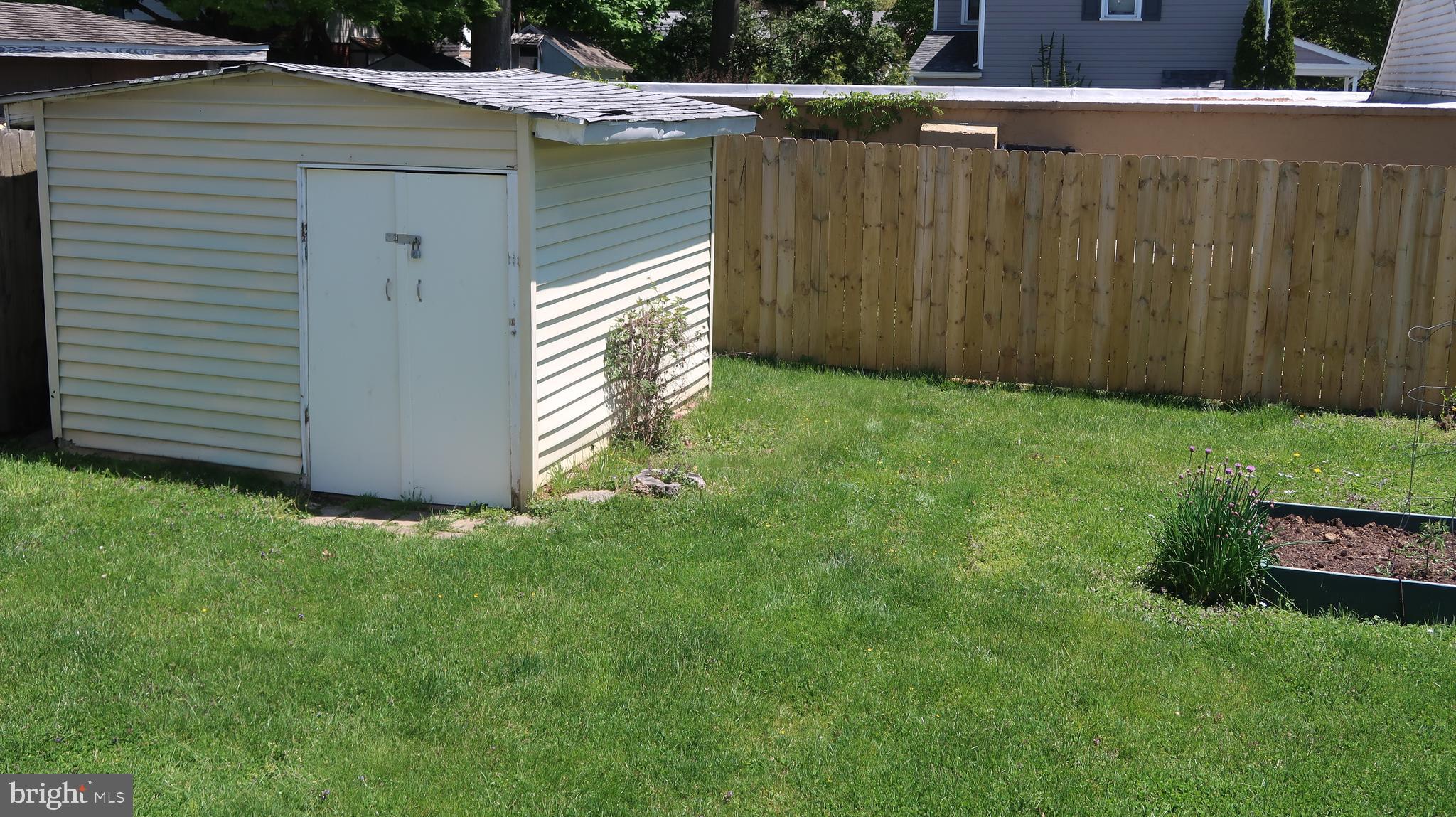 501 Blakeley Road Wallingford, PA 19086 - Photo 28 of 28 Backyard With Storage Shed