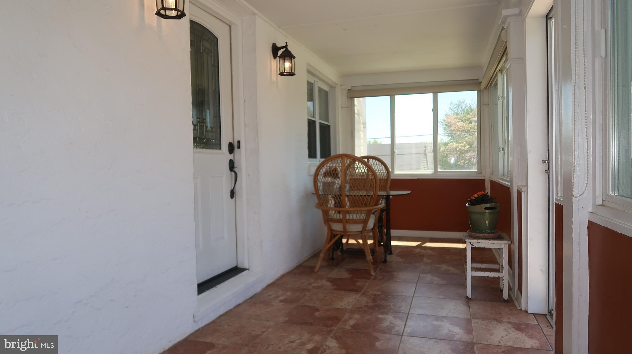 501 Blakeley Road Wallingford, PA 19086 - Photo 6 of 28 Three Season Front Porch