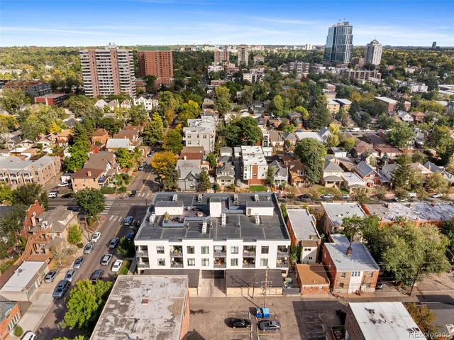 a view of city with ocean
