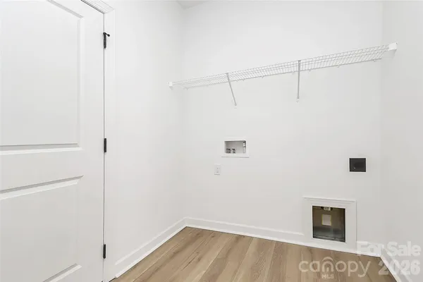a bathroom with a sink toilet a mirror and shower