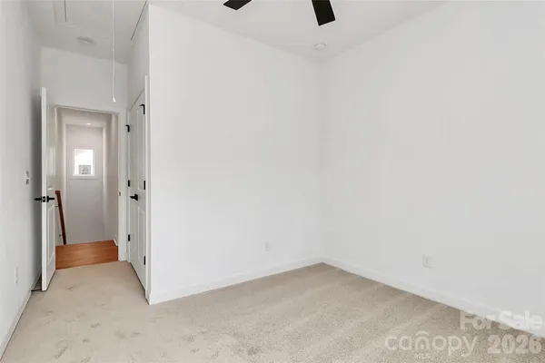 a view of an empty walk in closet