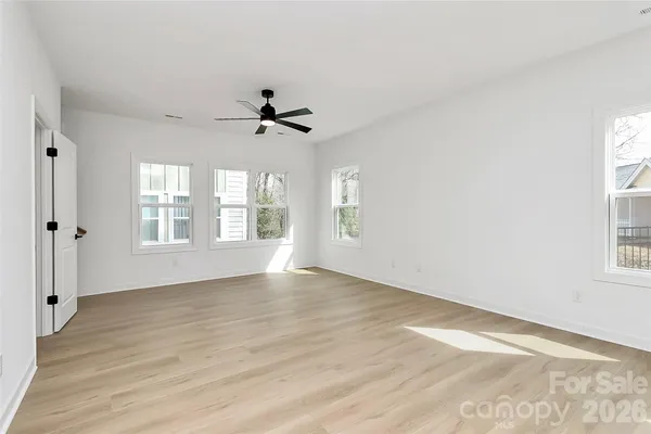 an empty room with windows