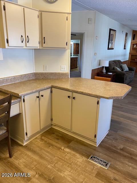 301 South Signal Butte Road, Unit 1124 Apache Junction, AZ 85120 - Photo 14 of 41 a kitchen with a sink and cabinets