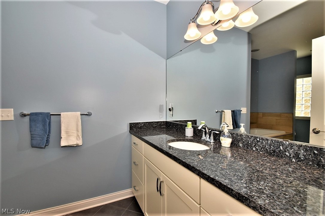 5125 River Creek Road Cleveland, OH 44124 - Photo 16 of 33 His and her granite topped vanities in master bath