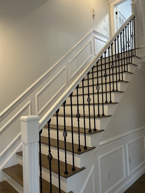 71 Weatherly Drive, Unit 71 Salem, MA 01970 - Photo 19 of 29 a view of staircase with wooden floor and white walls