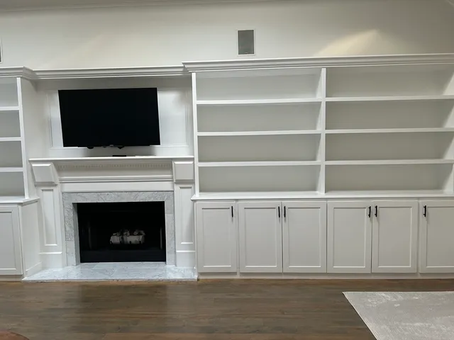 a living room with a fireplace