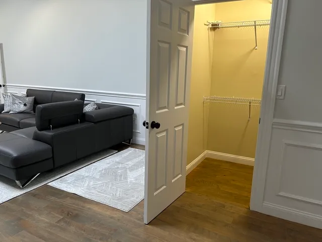 a living room with furniture and a gate
