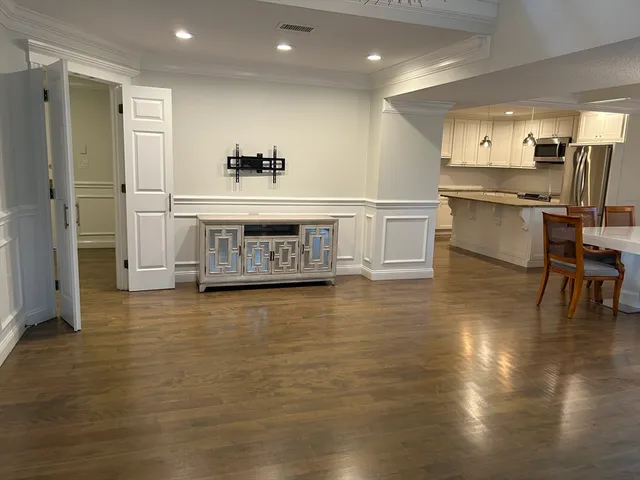 a view of kitchen with counter top space and stainless steel appliances