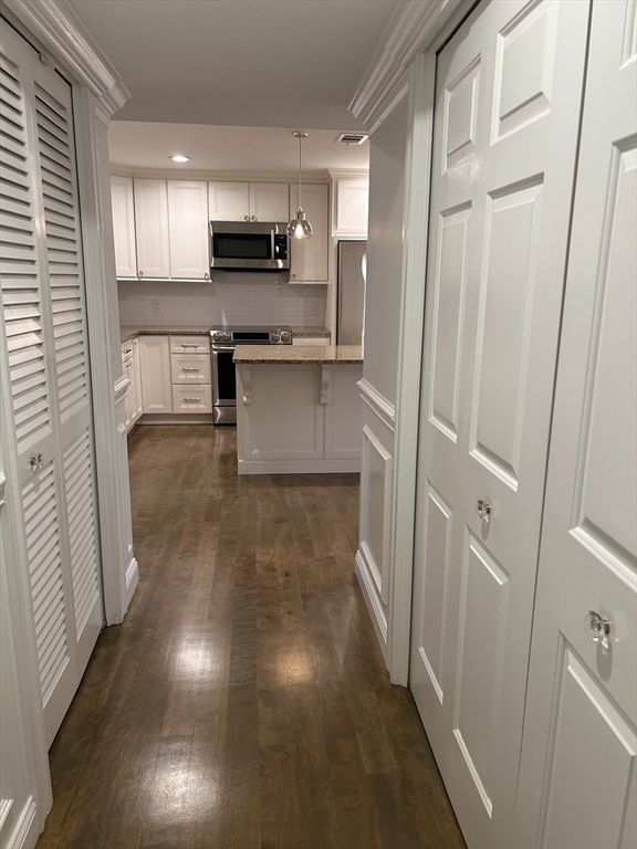 71 Weatherly Drive, Unit 71 Salem, MA 01970 - Photo 10 of 29 a view of a kitchen from the entryway