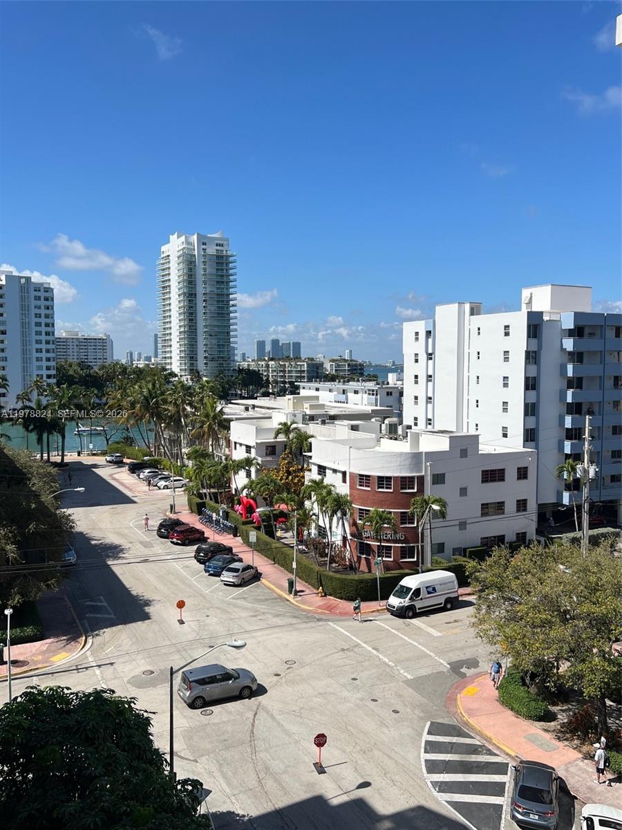 1340 Lincoln Road, Unit 705 Miami Beach, FL 33139 - Photo 18 of 21 a city view with tall buildings