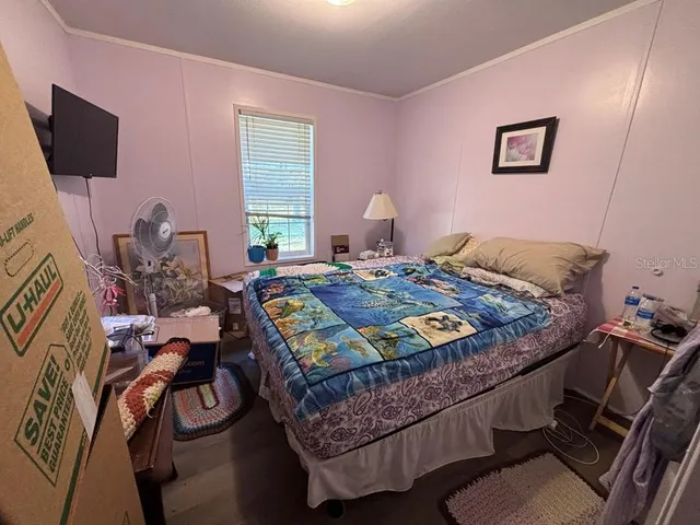 a backyard of a house with yard and outdoor seating