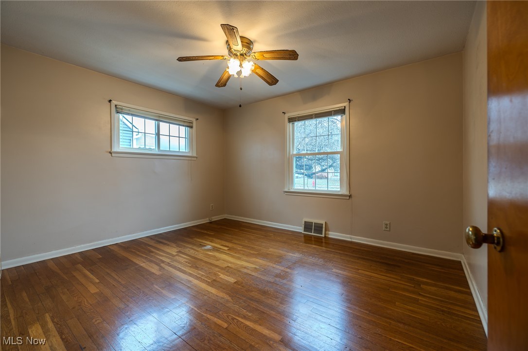 765 Pendley Road Willowick, OH 44095 - Photo 50 of 50 Spare room featuring dark hardwood / wood-style floors and ceiling fan