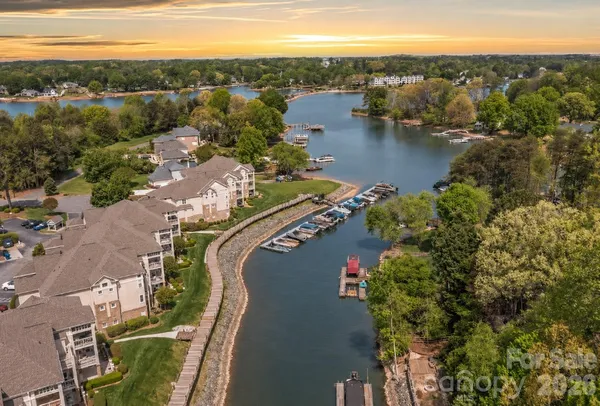 an aerial view of lake residential house with outdoor space