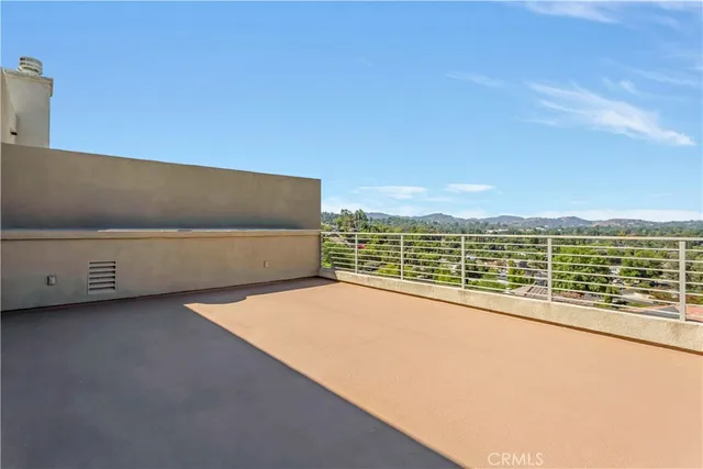 a view of swimming pool with an ocean view