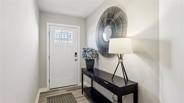 a view of staircase with wooden floor