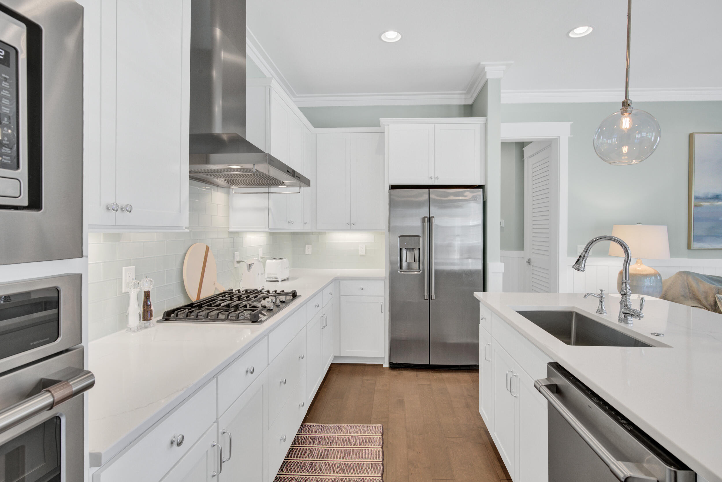 117 Prairie Pass Santa Rosa Beach, FL 32459 - Photo 11 of 33 a kitchen with stainless steel appliances granite countertop a sink stove and refrigerator