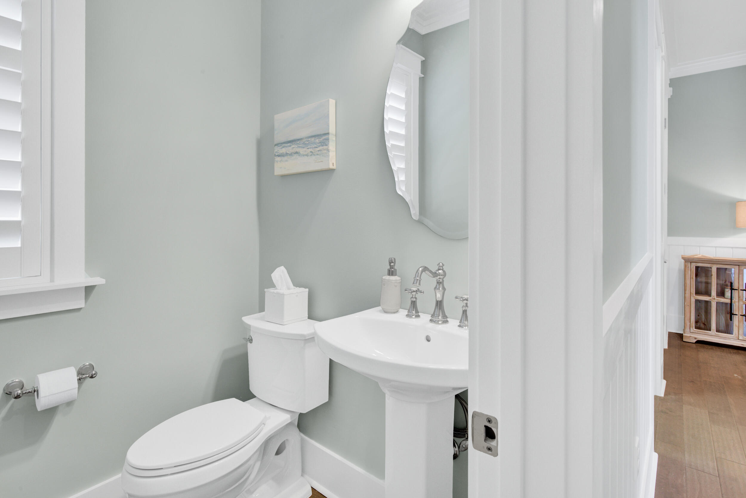 117 Prairie Pass Santa Rosa Beach, FL 32459 - Photo 13 of 33 a bathroom with a toilet sink and mirror