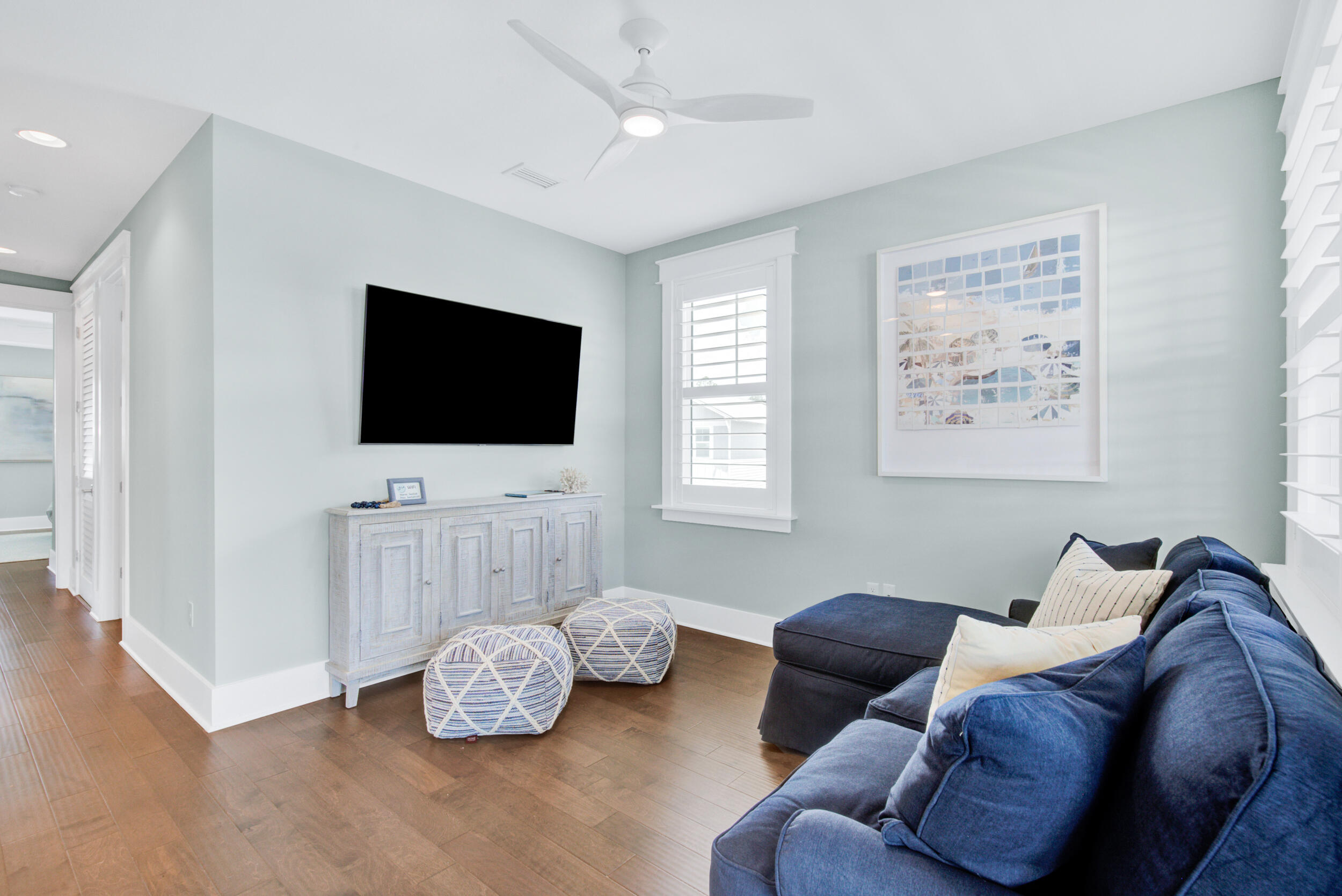 117 Prairie Pass Santa Rosa Beach, FL 32459 - Photo 19 of 33 a living room with furniture and a flat screen tv