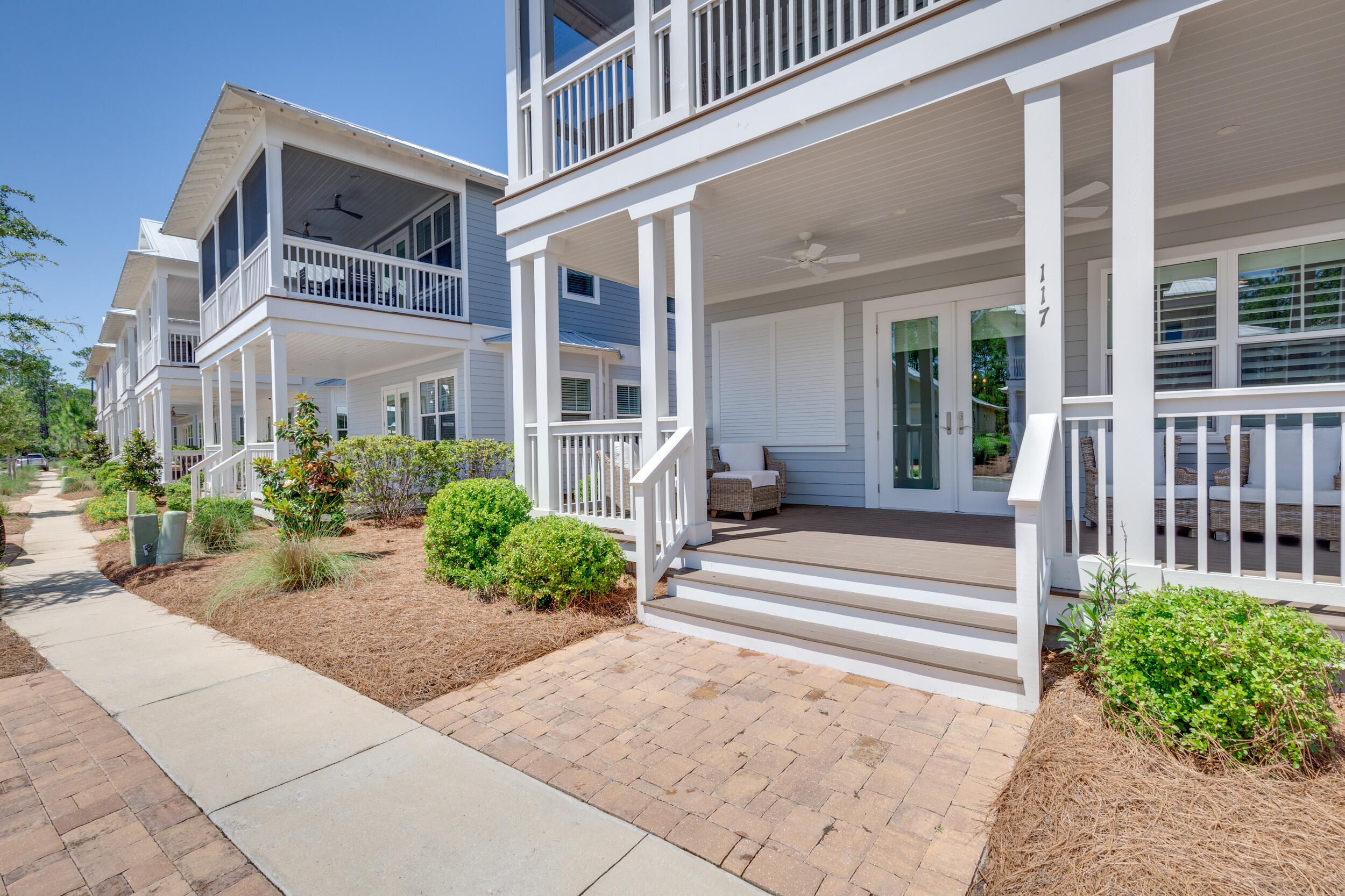 117 Prairie Pass Santa Rosa Beach, FL 32459 - Photo 2 of 33 a view of a building with a yard