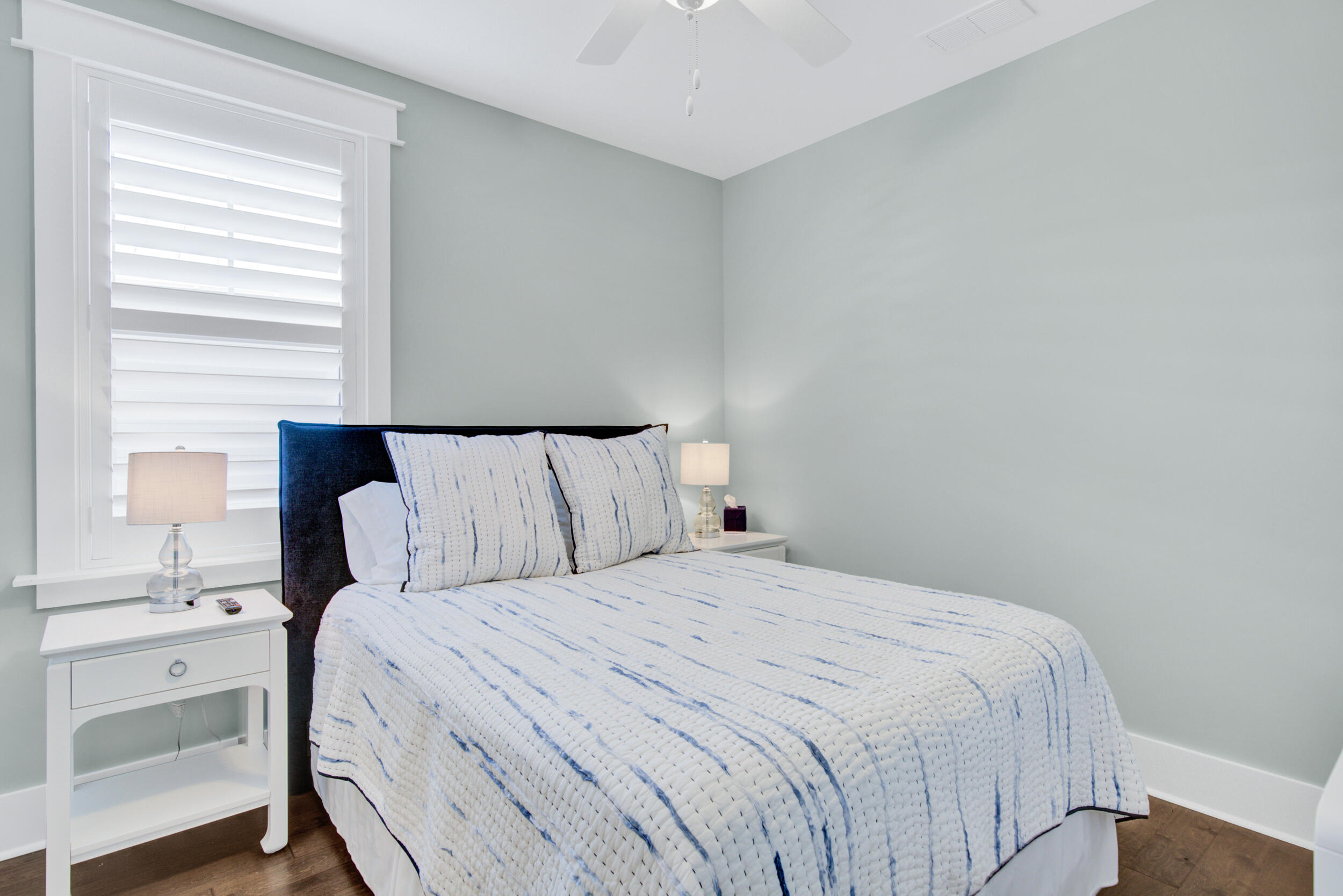 117 Prairie Pass Santa Rosa Beach, FL 32459 - Photo 23 of 33 a bedroom with a bed and a lamp