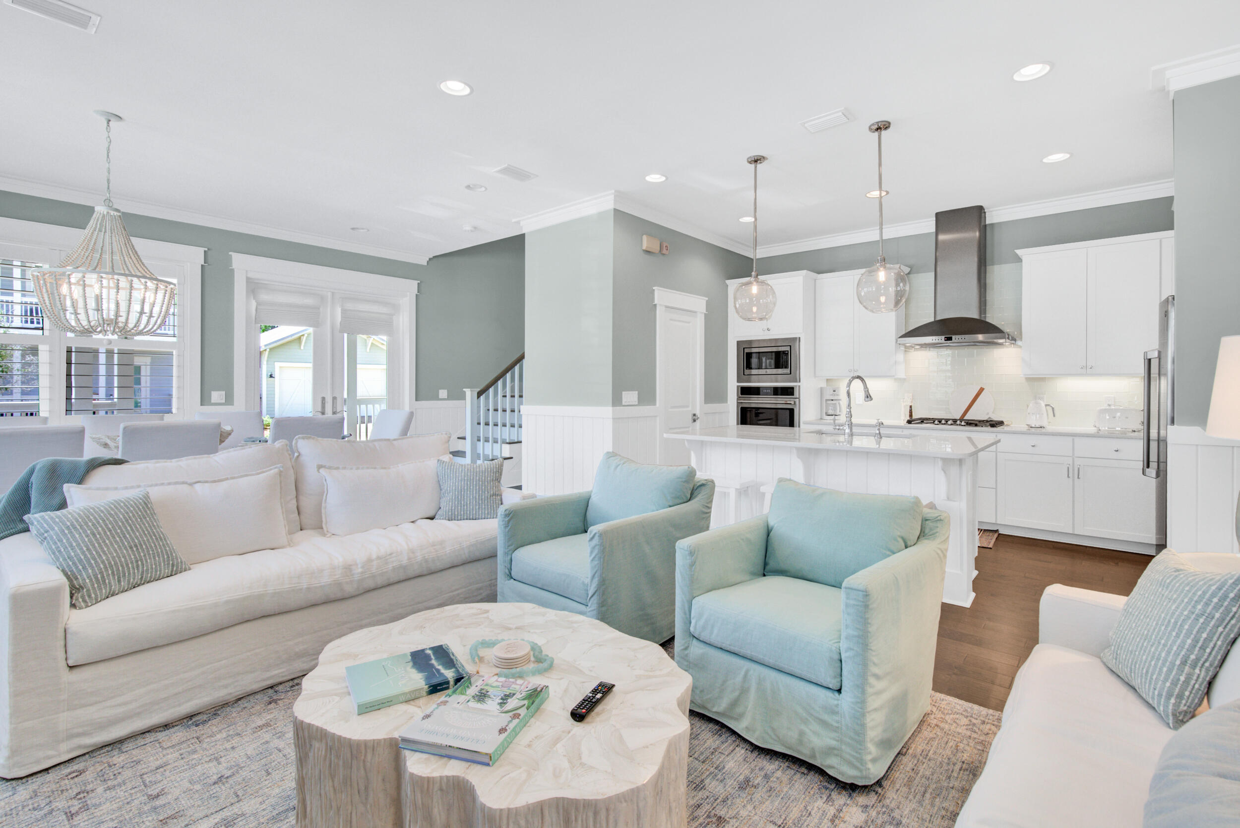 117 Prairie Pass Santa Rosa Beach, FL 32459 - Photo 8 of 33 a living room with furniture kitchen and a chandelier