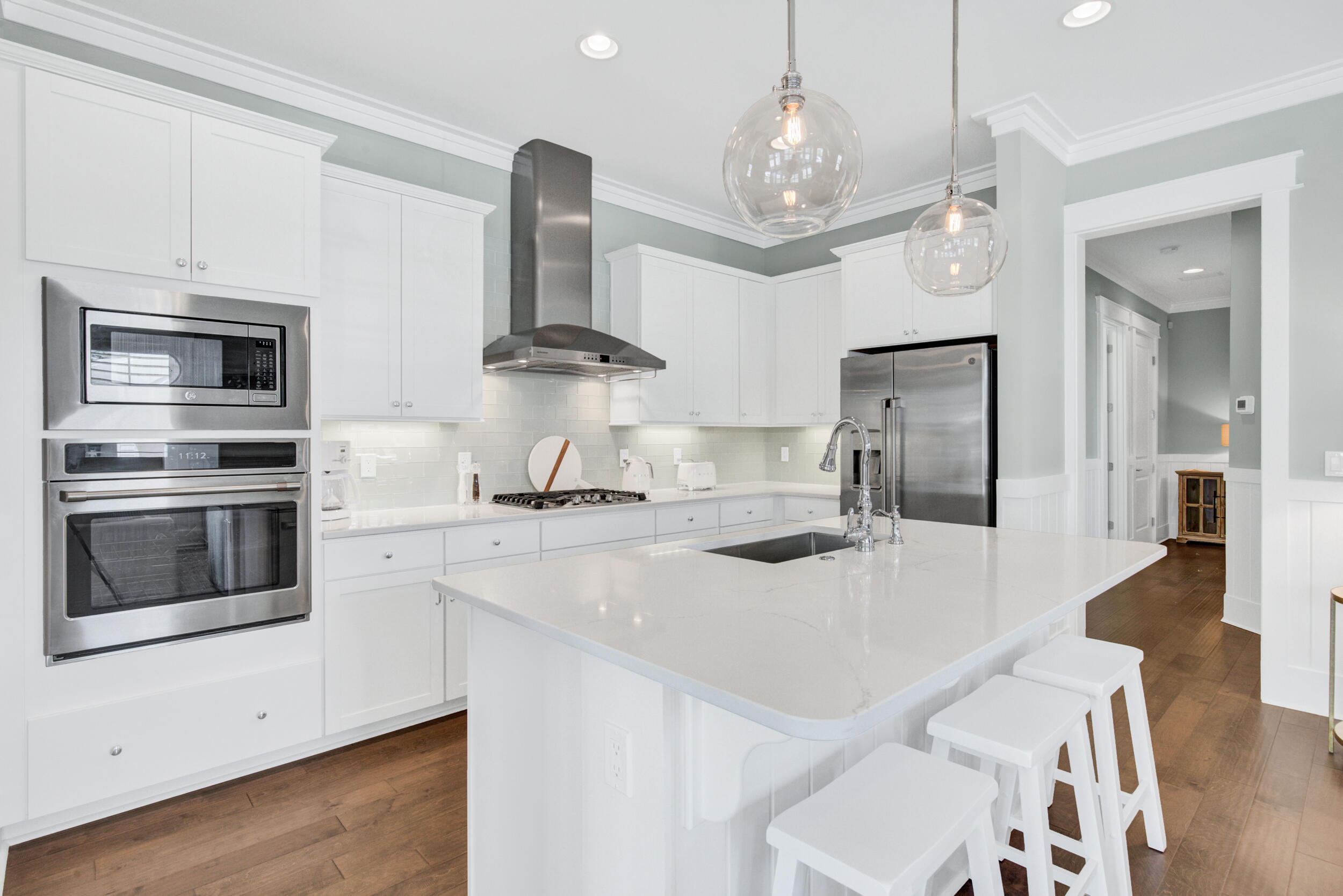 117 Prairie Pass Santa Rosa Beach, FL 32459 - Photo 9 of 33 a kitchen with stainless steel appliances a stove a sink and a refrigerator