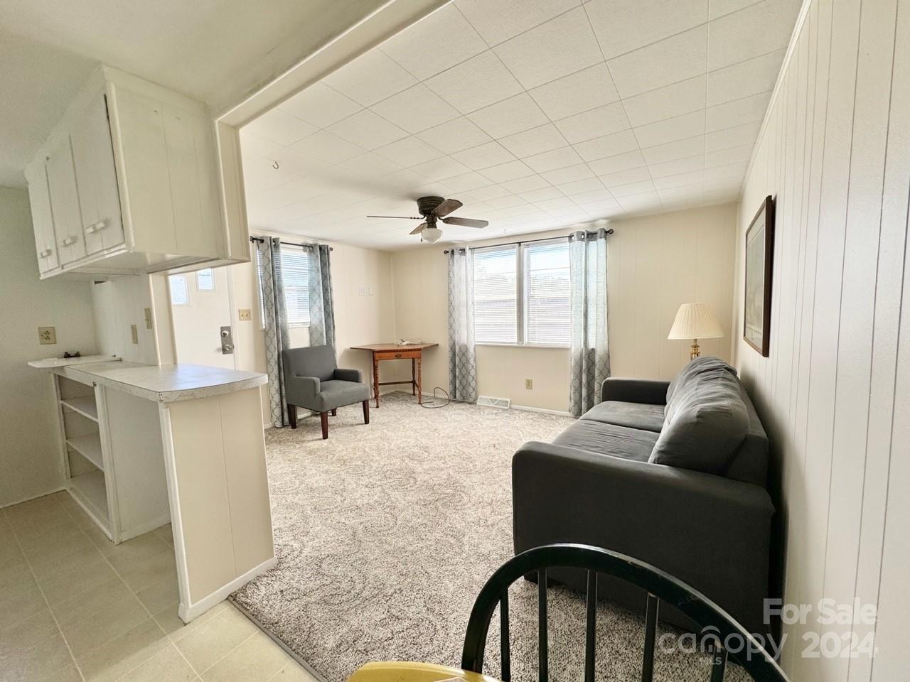 565 Neely Road Brevard, NC 28712 - Photo 24 of 28 a living room with furniture and a large window