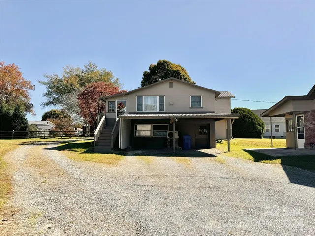 a view of a house with a swimming pool