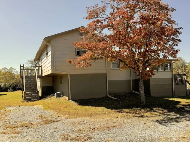 a view of a backyard of the house